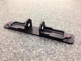 An overhead view of a black aluminum machined bracket developed by FedTech