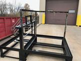 A close up view of the frame of a battery wash down station
