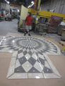 FedTech employee shows us their new tile entry floor design