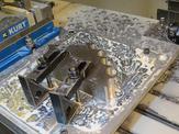 An overhead view of FedTech's load block going through the waterjetting process