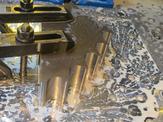 A close up view of FedTech's load block getting its profile parts waterjetted