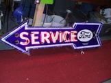 Finished Porcelain sign retrofitted with neon tubes