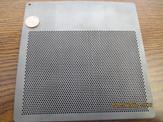 A close up view of a custom perforated plate