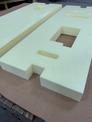  Custom cut foam boards used in an Industrial packaging solution with a corrugated box