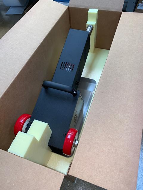 Waterjet cutting rigid extruded polystyrene foam boards for use in a Packaging application with an industrial tool. Waterjet cut a base layer for the box, Add the machine and some custom sized end fillers and then cap it off with a snug fitting top layer. The continuous closed cell structure and extruded skin surface provide superior impact protection and makes for a rigid box that ships well in today's logistic environment.