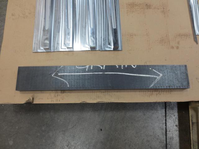 Upper link parts before they are waterjet cut