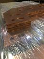 Waterjet copper plates stacked on top of each other