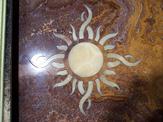 Custom sun flooring inlay design